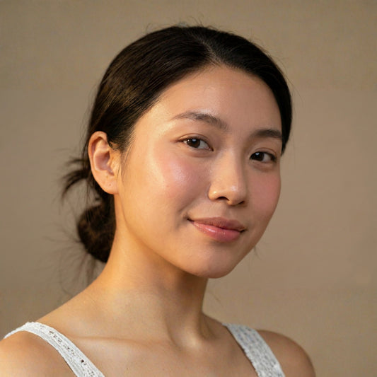 young woman with glowing skin in natural beauty